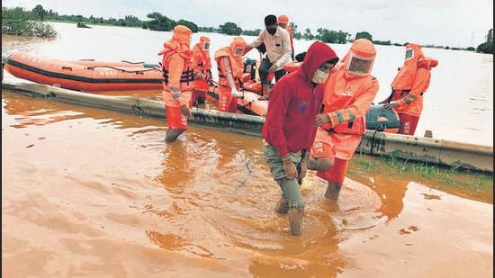 National Disaster Response Force (NDRF) team carries out rescue and relief operations at a flood-affected area in Karnataka’s Belagavi on Saturday.